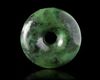 A CHINESE SPINACH JADE CARVED DISC PENDANT, 20TH CENTURY