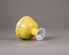 A Chinese yellow glazed stem cup