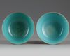 A pair of Chinese coral-ground gilt-decorated bowls
