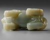 A PALE GREEN JADE CARVING OF A QILIN, 19TH CENTURY