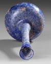 A COBALT BLUE GLASS SPRINKLER FLASK, 9TH–11TH CENTURY