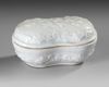 A CHINESE WHITE-GLAZED COVERED BOX, 17TH CENTURY