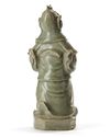 A CHINESE CELADON GUAN YU FIGURE, MING DYNASTY, 15TH CENTURY