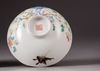 A pair of Chinese famille rose 'butterfly and flower' bowls
