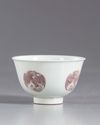 A small Chinese iron-red phoenix bowl