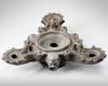 A ROMAN BRONZE THREE-NOZZLED OIL LAMP WITH THEATRE MASK AND ROSETTES AS DECORATION, CIRCA 1ST-2ND CENTURY A.D.