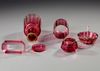 A TOILETSET OF CRANBERRY BACCARAT, CIRCA 1870