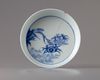 A blue and white 'crabs' bowl