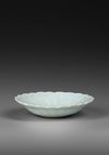 A CHINESE YINGQING SAUCER DISH, SONG DYNASTY ( 960–1279)