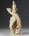 A Chinese ivory carving of a Guanyin on a phoenix