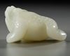 A GROUP OF CHINESE WHITE AND PALE CELADON JADE MYTHICAL BEAST CARVINGS, 20TH CENTURY