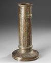 A QAJAR BRASS TORCH STAND, PERSIA, 19TH CENTURY
