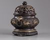 A Chinese parcel-gilt bronze 'sea creatures' censer, cover, and stand