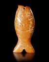 A REDDISH-YELLOW JADE "FISH" CARVING, CHINA, LIANGZHU CULTURE