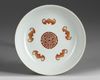 A Chinese coral-ground famille verte 'boys' dish