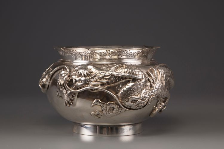 A silver ‘dragon' foliate rim punch bowl
