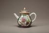 A famille rose teapot and cover