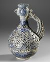 A KASHAN RETICULATED COCKEREL-HEAD POTTERY EWER, PERSIA,  13TH CENTURY