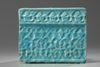 An Islamic kashan turquoise glazed tile