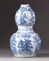 An unusual Chinese blue and white double-gourd vase