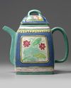 A Chinese famille rose enamelled yixing teapot and cover