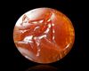 A ROMAN INTAGLIO SHOWING A BOY ON A DOLPHIN, ROMAN, 1ST CENTURY BC-AD