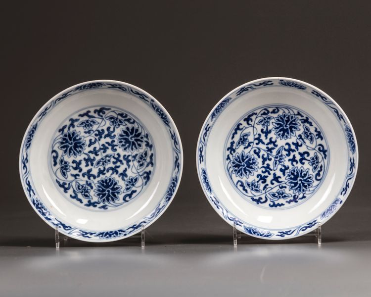 A pair of Chinese blue and white 'lotus' dishes