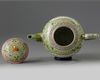 A Chinese lime-green ground famille rose teapot