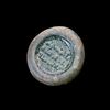 AN EARLY ISLAMIC GLASS WEIGHT OF DIRHAM,10TH-11TH CENTURY