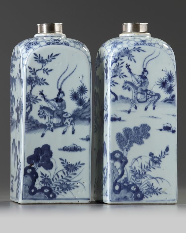 A pair of Chinese blue and white square bottles and silver covers