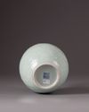 A celadon glazed bottle-vase