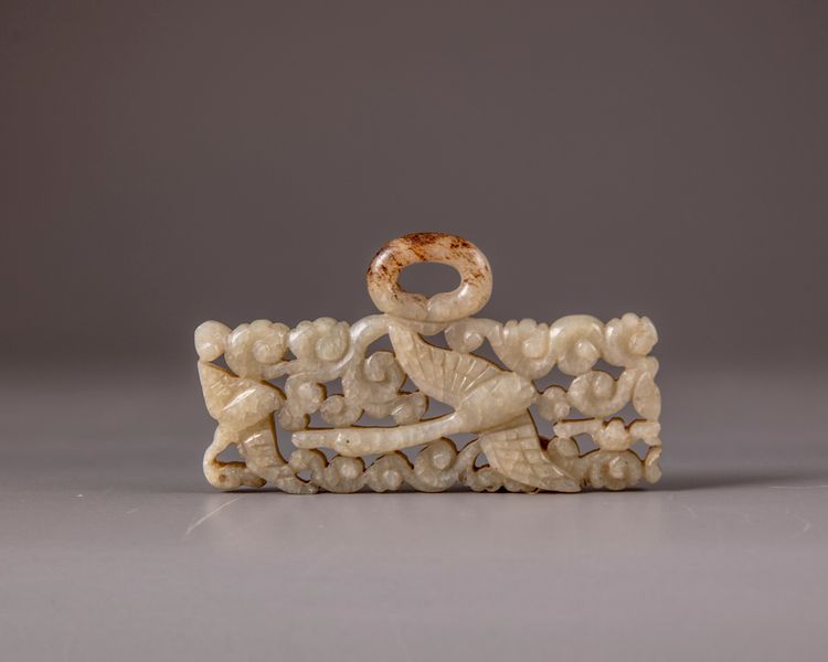 A Chinese celadon jade openwork 'geese' plaque