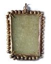 A FINE JADE CARVED PENDANT
