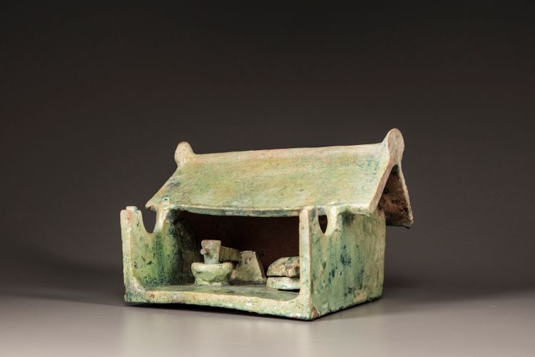 A green-glazed pottery milling shed