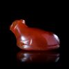 A RECLINING BULL AMULET IN CARNELIAN, EASTERN MEDITERRANEAN, 6TH CENTURY BC