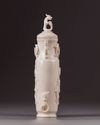 A Chinese ivory ‘chilong’ vase and cover