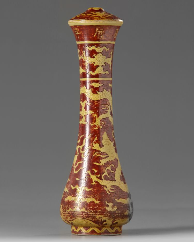 A CHINESE IRON-RED AND YELLOW-ENAMELLED 'DRAGON' BRUSH HANDLE, QING DYNASTY (1644-1911)