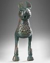 A BRONZE FINIAL IN THE FORM OF HARE, POSSIBLY FATIMID, 11TH-13TH CENTURY