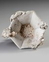 A CHINESE BISCUIT PORCELAIN BEAKER, 17TH CENTURY