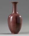 A Chinese aubergine-glazed incised-decorated 'dragon' vase